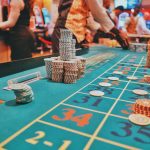 a casino table with a lot of chips on it