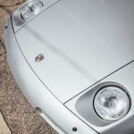 white car on brown concrete floor