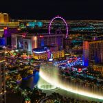 city with lights turned on during night time