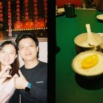 A woman and a man smiling at a table with a dessert bowl
